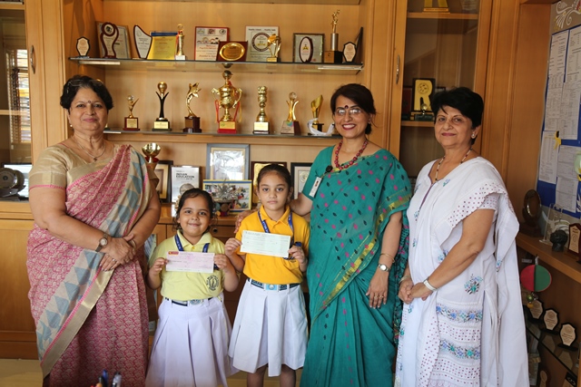 STAND FOR KERALA FLOODS : A GENEROUS CONTRIBUTION BY Brahm Dutt Blue Bells Public School IN THE KERALA CHIEF MINISTER’S RELIEF FUND